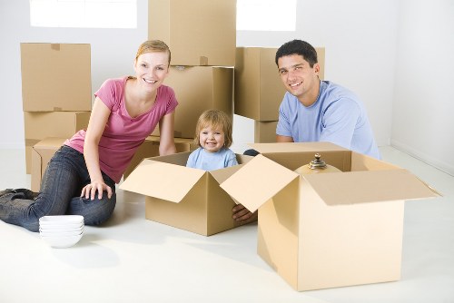Professional packers handling moving boxes in Harrow Self Storage