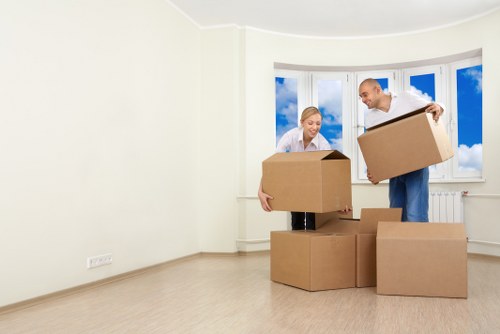 Professional movers loading a van in Harrow
