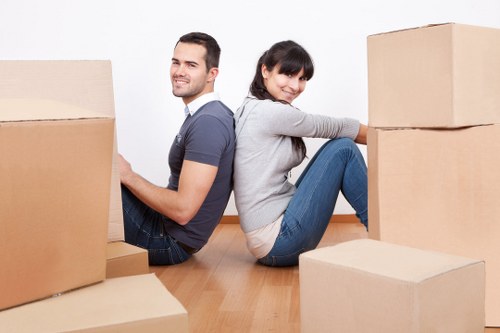 Customer assisting with loading a moving truck