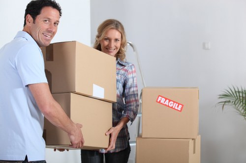 Experts unpacking items in a new home